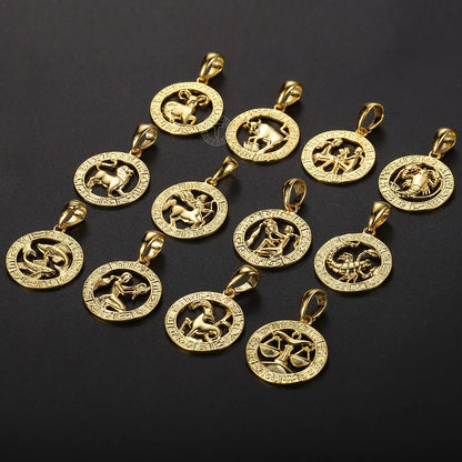 Gold zodiac pendants on a black background