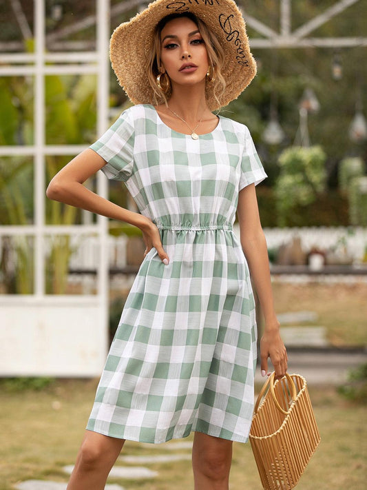 Smocked Plaid Round Neck Short Sleeve Dress Carauana Store
